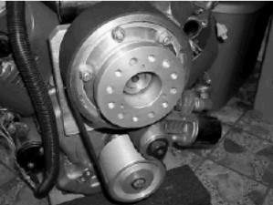Reduction belt with a tensioner