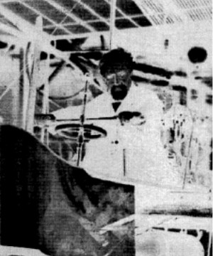Maxim at the controls of his device