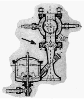 The arrow indicates the ball cage
