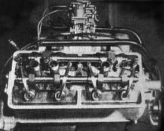 New head with inclined valves