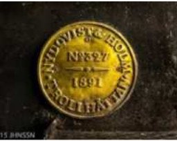 Nydquvist & Holm locomotive plate
