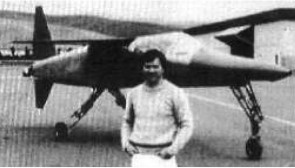 Pilot Montagne in front of his plane