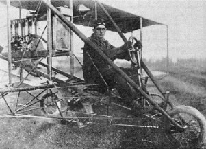 Fred Eells with his biplane