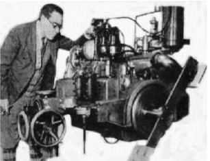 Colburn and his engine with plate reel